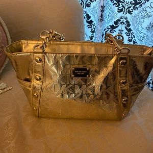 Michael Kors monogram gold metallic bag